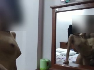 Asian in panties gives a standing fuck in front of a mirror.