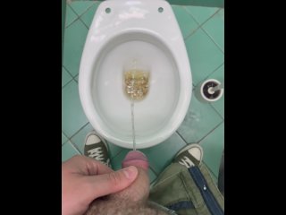 Pissing in public bathroom