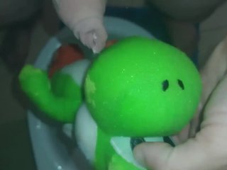 Small Yoshi dinosaur pee