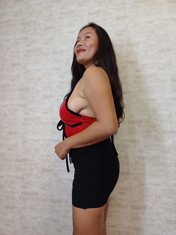 Thaiger Posing in a Red Top with a Tight Black Skirt
