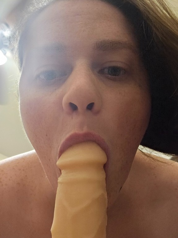 Sucking the dildo