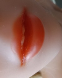 Cameron getting in position for her first anal fuck. photo