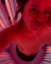 Titties and tanning photo