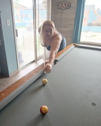 Big ass and pool sticks photo