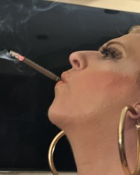CIGAR  GIRL SMOKING photo