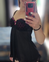 Incredible redhead showss her pink pussy photo