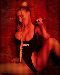 Monika Foxxx Poses in Sexy Black Bodysuit photo