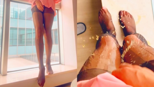 Squirting In Front Of Floor-To-Ceiling Windows While Sporting Black Stockings