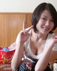 Sweet Chinese babe teasing in lingerie photo