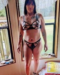 Mistress Mandee in fetish gear photo