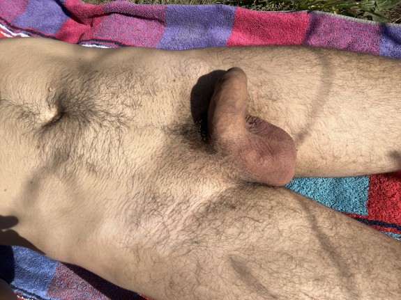 Lying naked in the warm spring sun