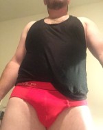 This Bulges for you - Big package stuffed in some sheer sexy red briefs