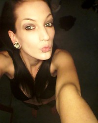 Sexy with black hair and snake bites photo