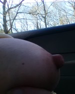 in car playing with tits