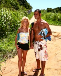 CHLOE DELAURE Anal outdoors on the beach with two cocks photo