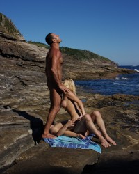 CHLOE DELAURE Anal outdoors on the beach with two cocks photo