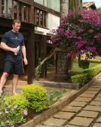 Hot asian girl makes a double penetration into the home garden photo