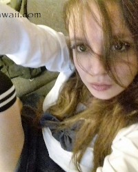 Hot girl in school uniform. So darn kawaii! photo
