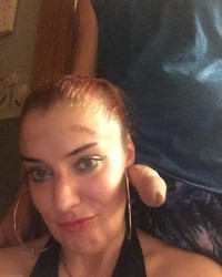 Sexy red haired wife sucks cock photo