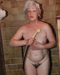 Extremely old grandma and toys photo