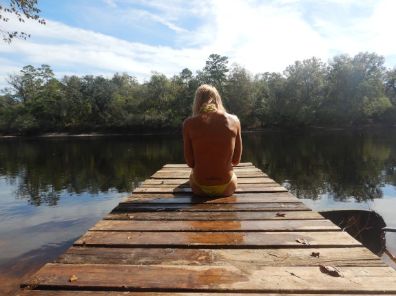blonde public river sunbathing in thong with booty shorts