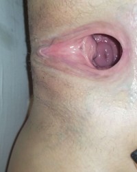 Wife's creampied pussy hole photo
