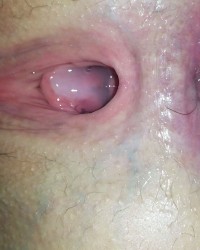 Wife's creampied pussy hole photo