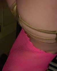Pink fishnet top exposing my tits photo