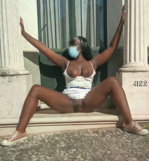 Sexy ebony Stripping Outside