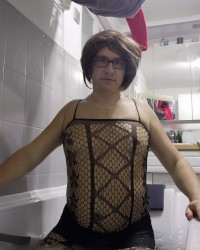 PAtty crossdresser in a bath in bodystocking photo