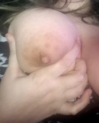 Amateur slut showing off my tits photo