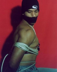 Kleber Thorres in bondage for the first time (2002) photo