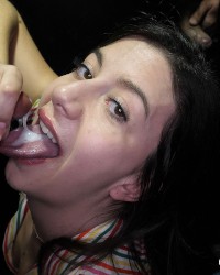 Nasty Nat Swallows Multiple Loads In Gloryhole photo