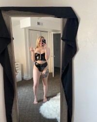 Sexy leather blonde babe photo