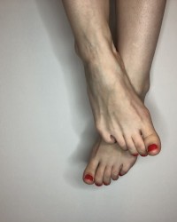 my feet and red nails photo
