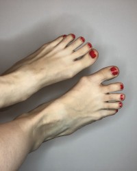 my feet and red nails photo