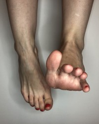 my feet and red nails photo