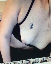 My shaved pussy and pierced nipples photo