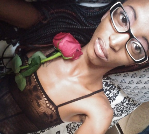 Classy ebony teen with Rose