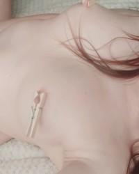 Feeling cute with clothespins on my nipples photo