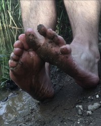 Muddy Filthy dirty bare feet photo