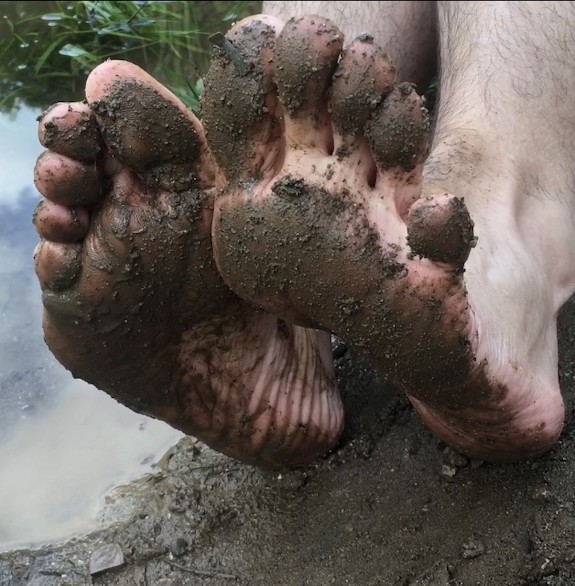 Muddy Filthy dirty bare feet