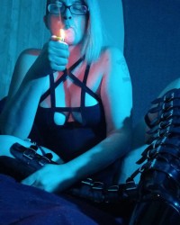Punk cutie smoking a cigar photo