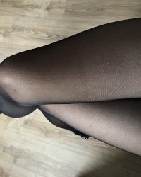 Sexy black stockings legs photo