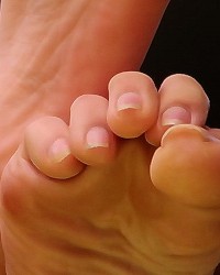 Candid Desk Sole Flexing Toe Wiggling Full photo