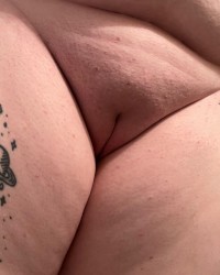 Sylvia admires her pussy before fucking it with pink dildo photo