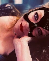 The Catwoman… co-starring Batman photo