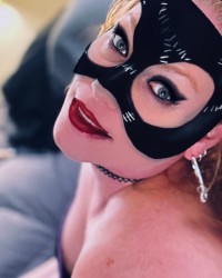 The Catwoman… co-starring Batman photo