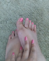 Legs, feet and painted toe nails💦🦶💅 photo