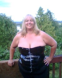 Mature Fetish BBW in Latex, PVC and Vinyl Plays with Toys photo